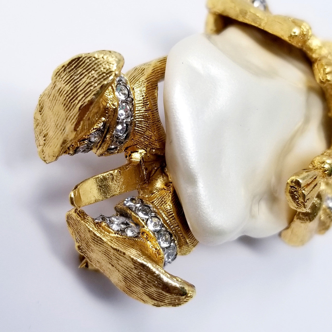 Kenneth Jay Lane Smiling Genie Crystal Pin in Gold