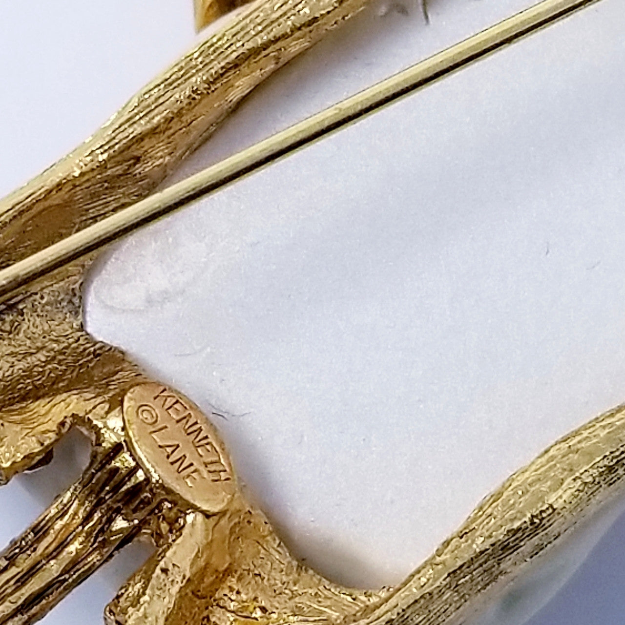 Kenneth Jay Lane Smiling Genie Crystal Pin in Gold