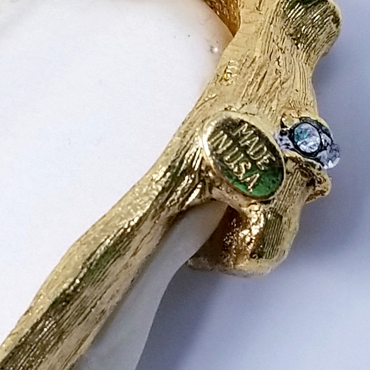 Kenneth Jay Lane Smiling Genie Crystal Pin in Gold