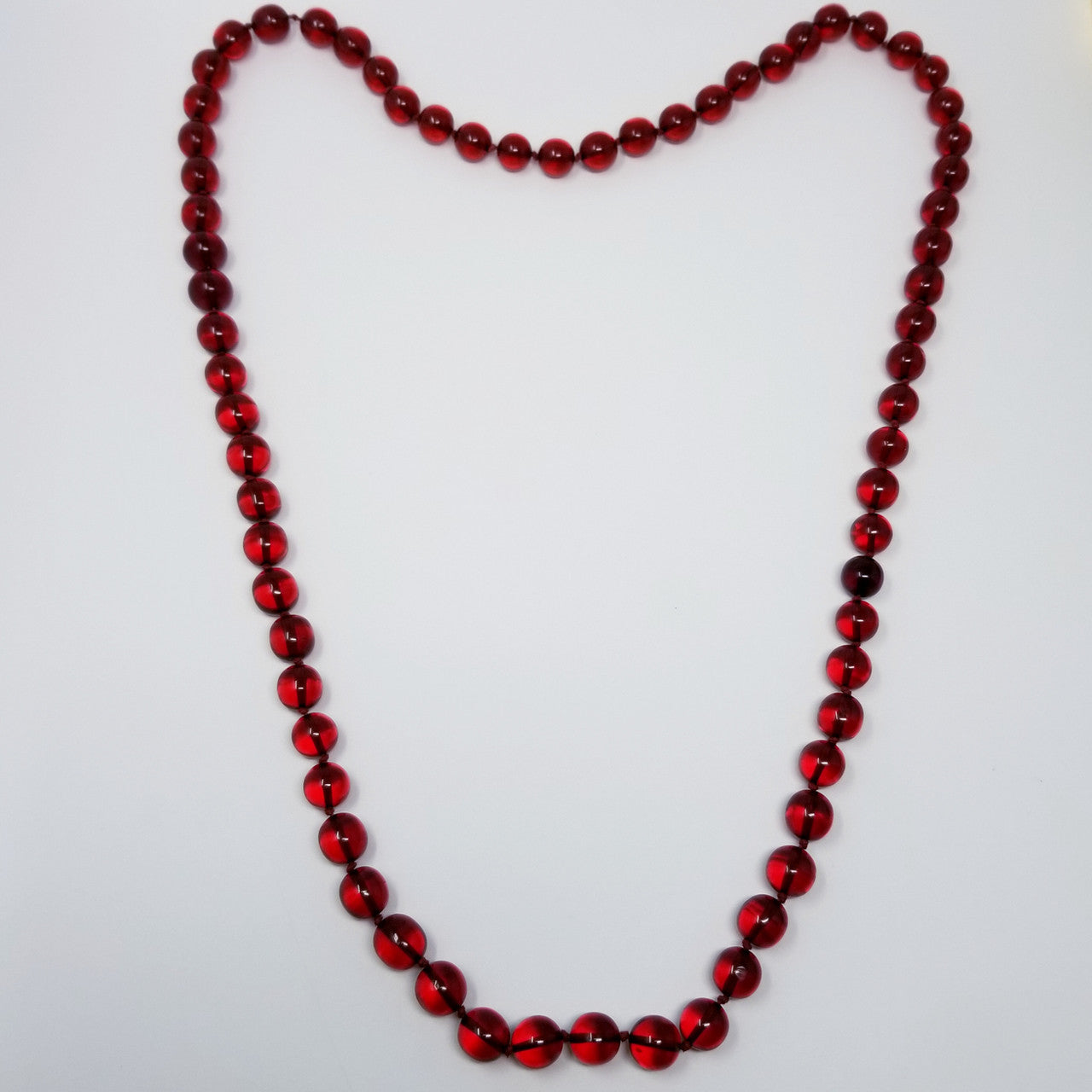 Red Cherry Amber Bakelite 46" Rope Bead Necklace