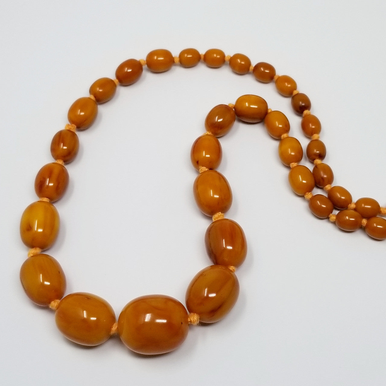Vintage Butterscotch Amber Bakelite 29" Graduated Bead Necklace
