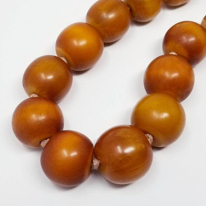 Vintage Amber Butterscotch Bakelite 19" Graduated Bead Necklace w/ 14K gold clasp