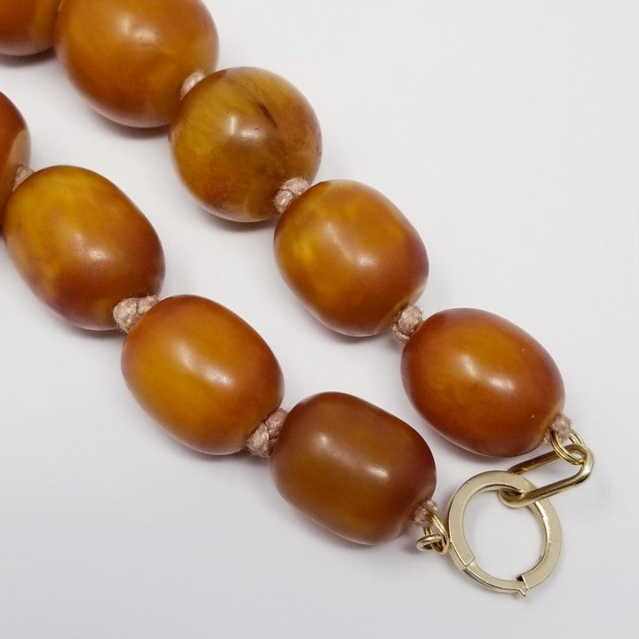 Vintage Amber Butterscotch Bakelite 19" Graduated Bead Necklace w/ 14K gold clasp