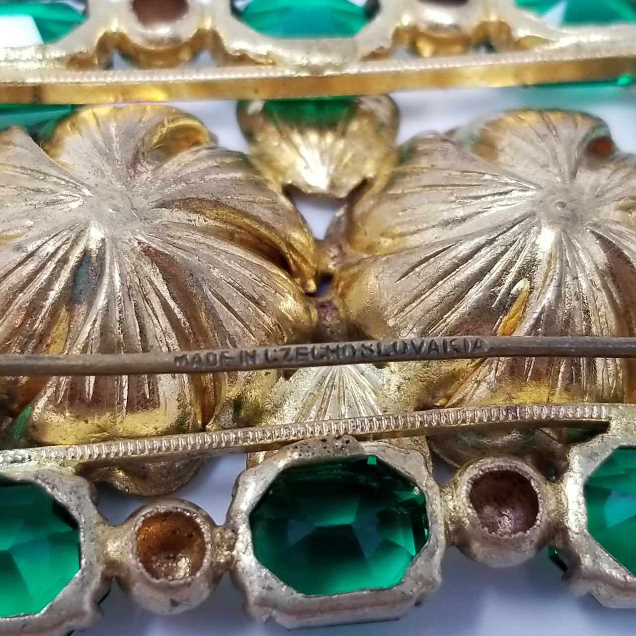 Vintage Czechoslovakia Signed Floral Rectangular Brooch with Green Crystals in Gold Tone