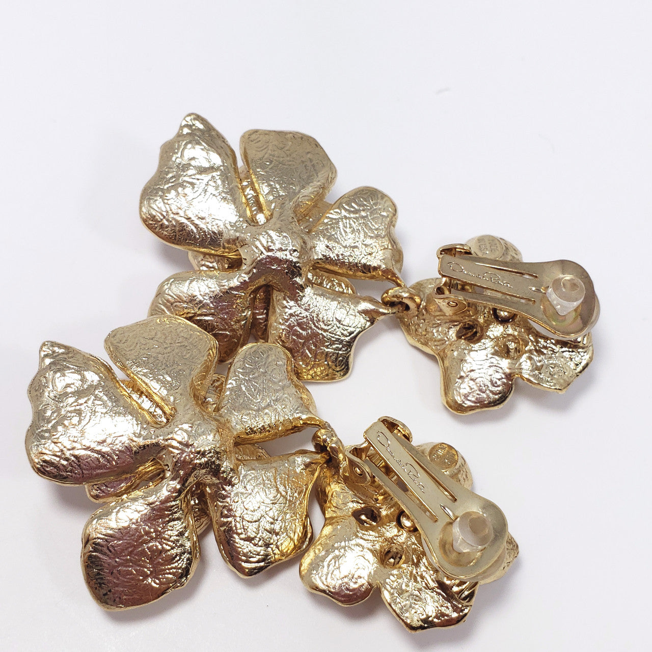 Oscar de la Renta Gold Bold Dangling Flower Drop Clip On Earrings