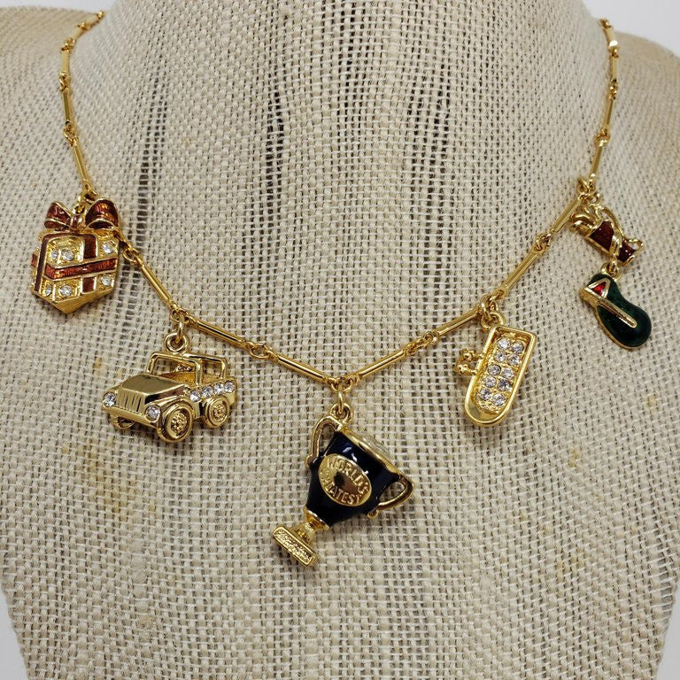 Kenneth Jay Lane Bar Link Charm Necklace in Gold, features Trophy, Car, Golf