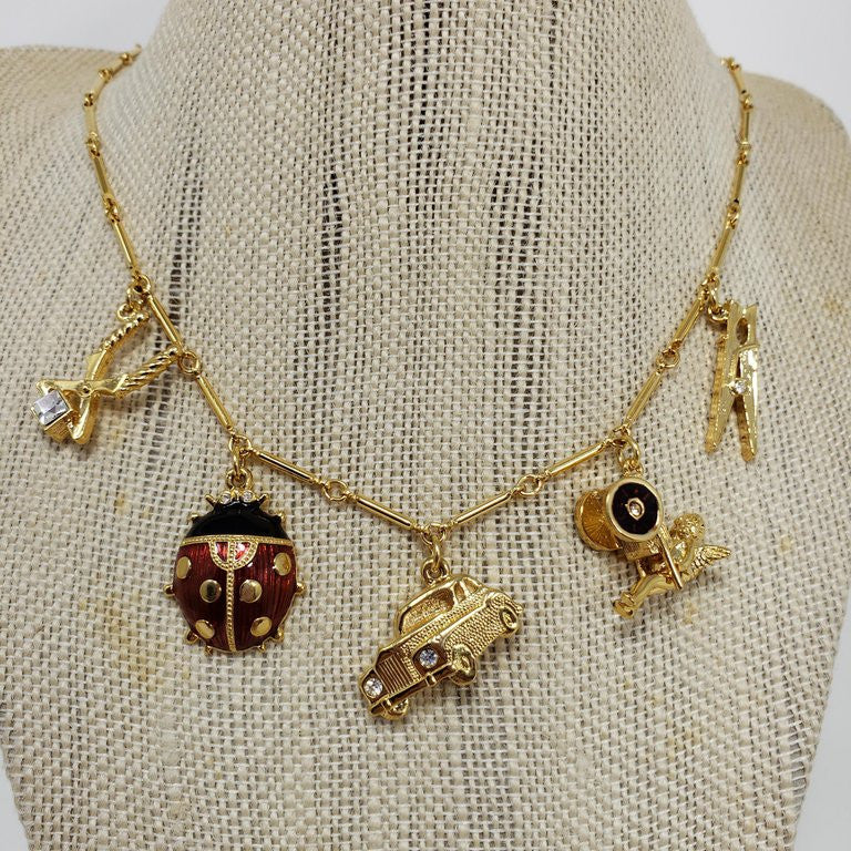 KennethKenneth Jay Lane Bar Link Charm Necklace in Gold, features Ladybug, Car, Angel
