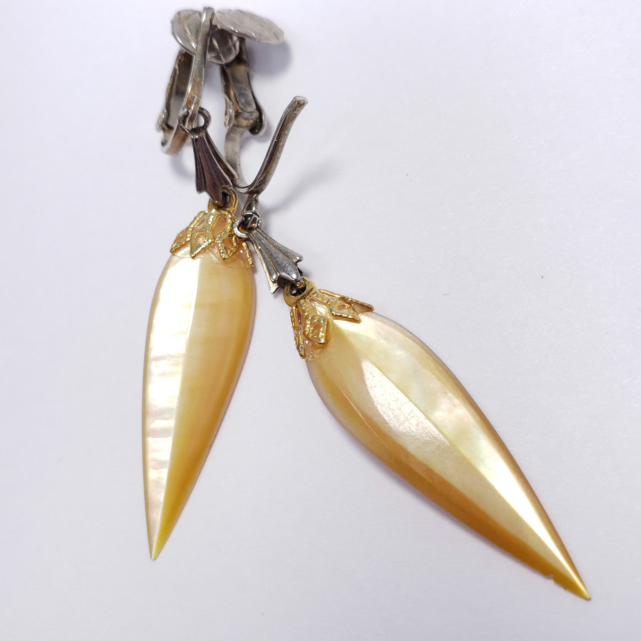 Dangling Clip On Earrings with Pointed Faceted Translucent Yellow Resin Accents