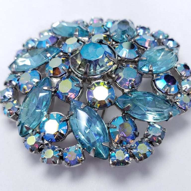 Aurora Borealis Crystal Round Abstract Flower Motif Brooch in Silver, mid 1900s