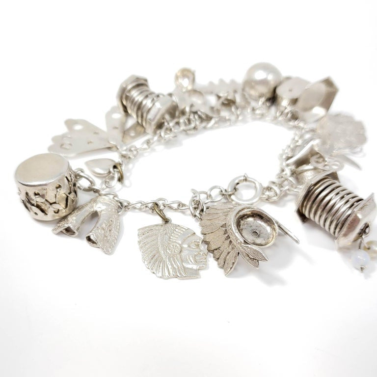 Sterling Silver 19 Charm Assortment Chain Bracelet, Mid 1900s, Mexico