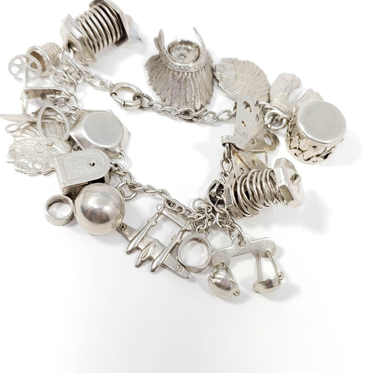 Sterling Silver 19 Charm Assortment Chain Bracelet, Mid 1900s, Mexico