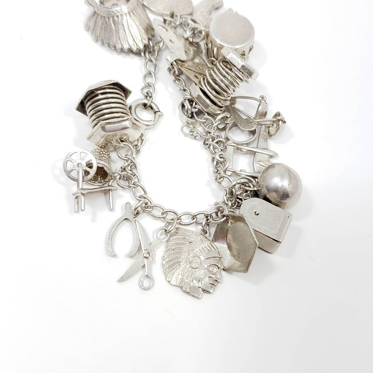 Sterling Silver 19 Charm Assortment Chain Bracelet, Mid 1900s, Mexico