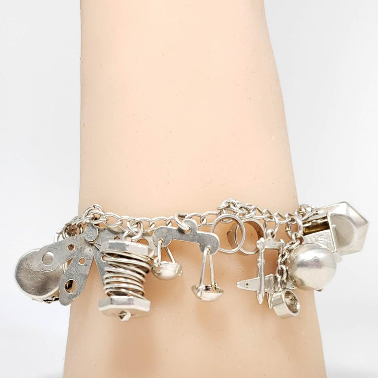 Sterling Silver 19 Charm Assortment Chain Bracelet, Mid 1900s, Mexico