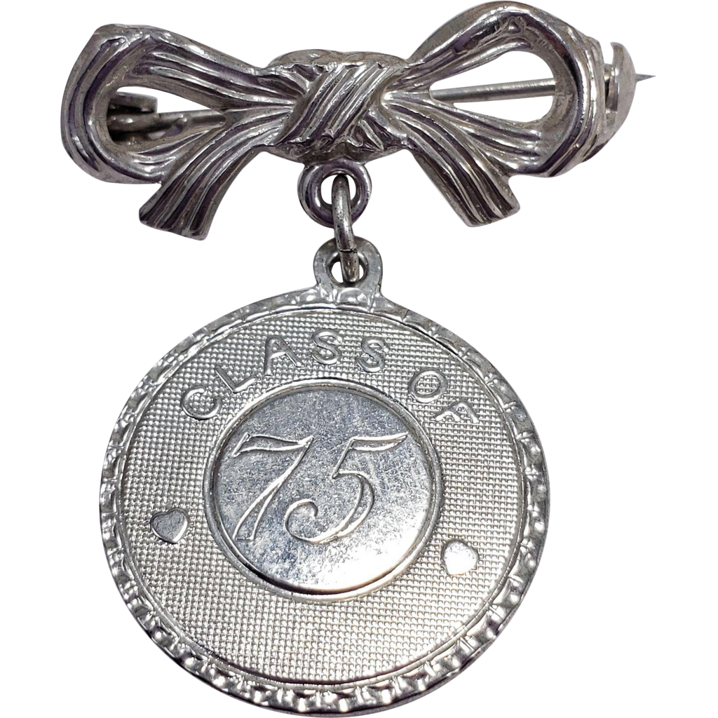 Dangling Bow and Coin Pin Brooch Class of 75, 1975, in Silver Tone