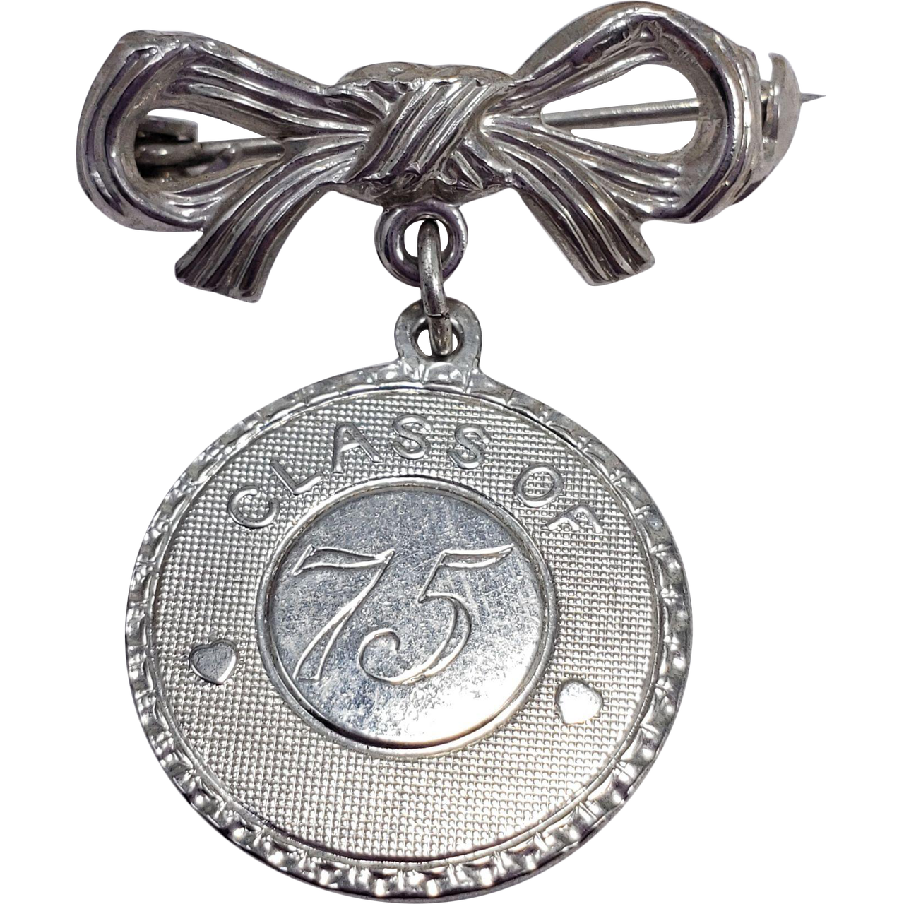 Dangling Bow and Coin Pin Brooch Class of 75, 1975, in Silver Tone