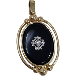 Two Sided Reversible Pendant Black and Gold-tone With Crystal Accents and Raised Metal Designs