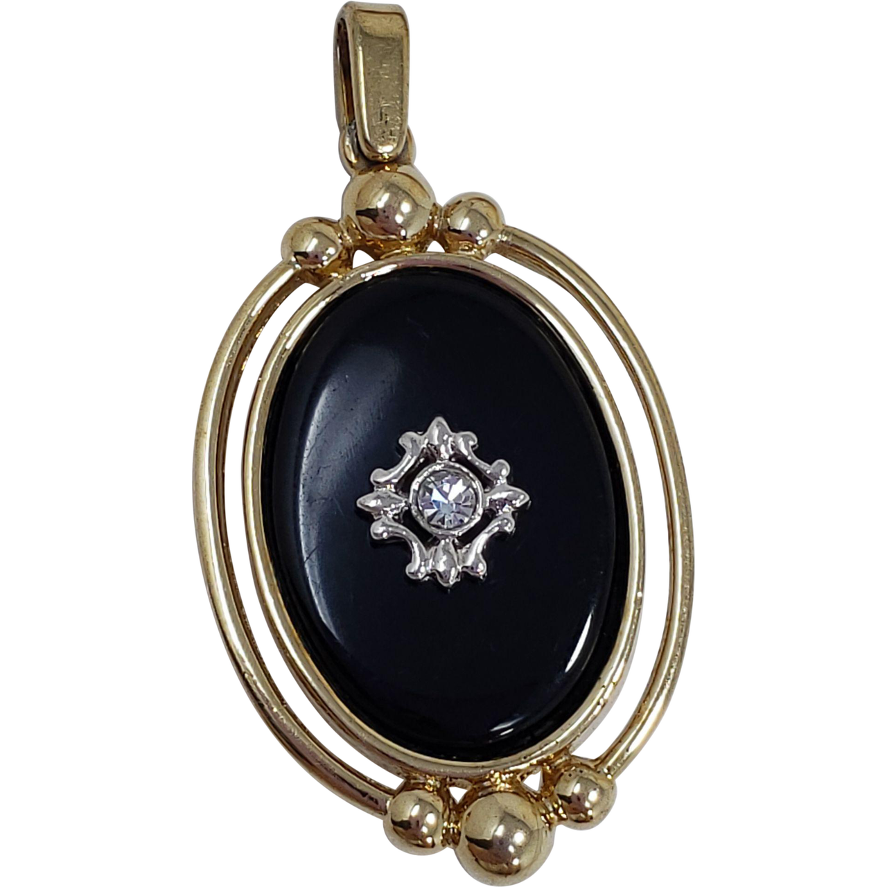 Two Sided Reversible Pendant Black and Gold-tone With Crystal Accents and Raised Metal Designs