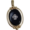 Two Sided Reversible Pendant Black and Gold-tone With Crystal Accents and Raised Metal Designs