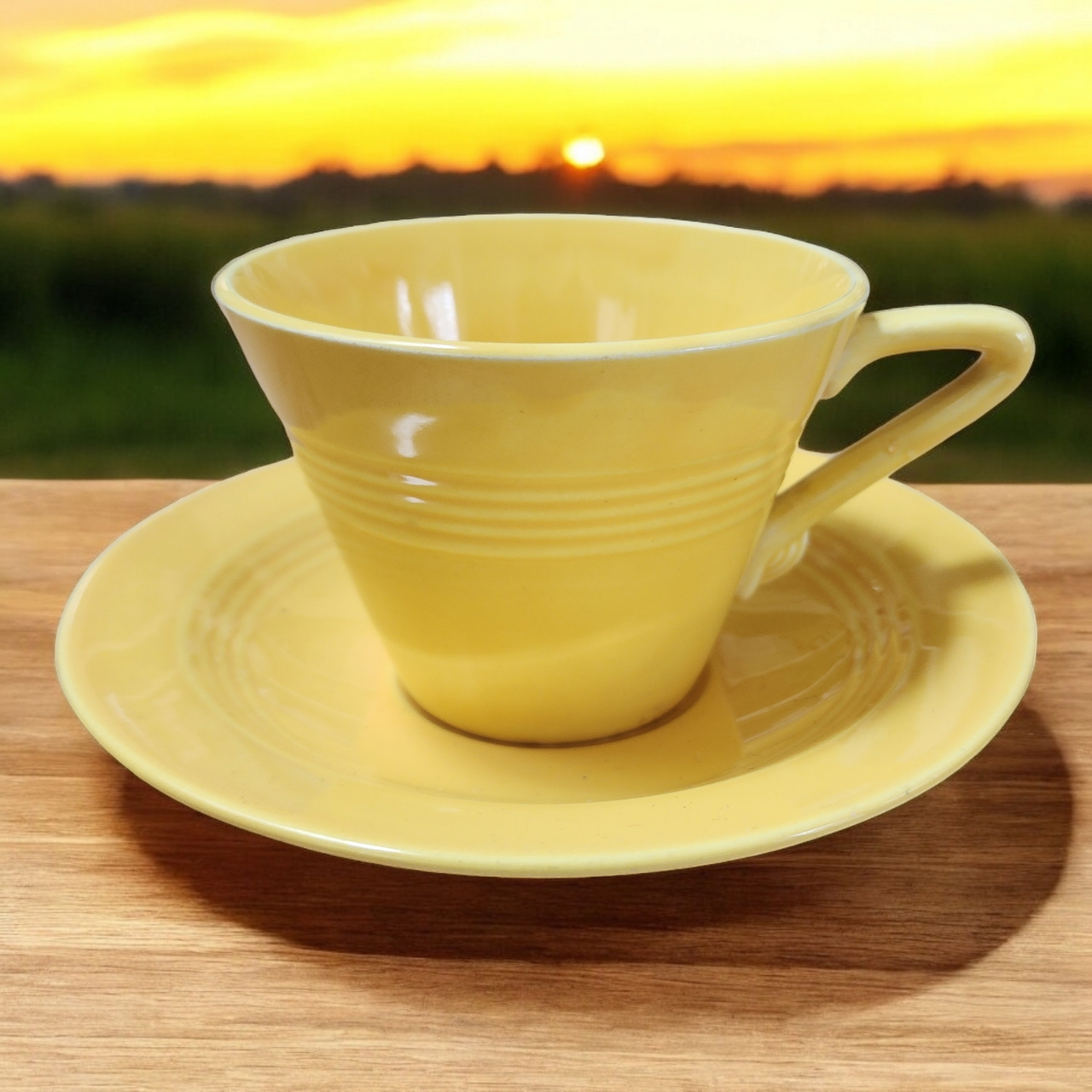 Homer Laughlin Fiesta Yellow Older Flat Cup & Saucer Set
