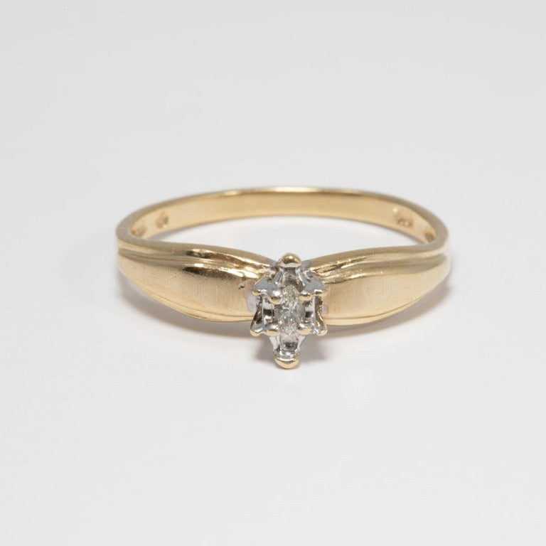 Diamond Solitaire Ring, 14 Yellow and White Gold Raised Setting, .05 ct Marquise