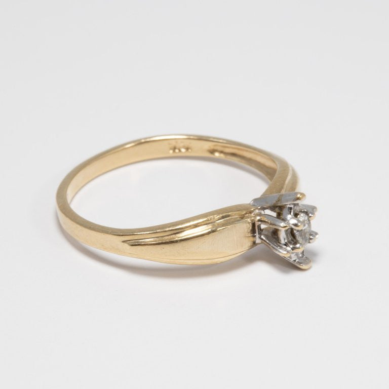 Diamond Solitaire Ring, 14 Yellow and White Gold Raised Setting, .05 ct Marquise