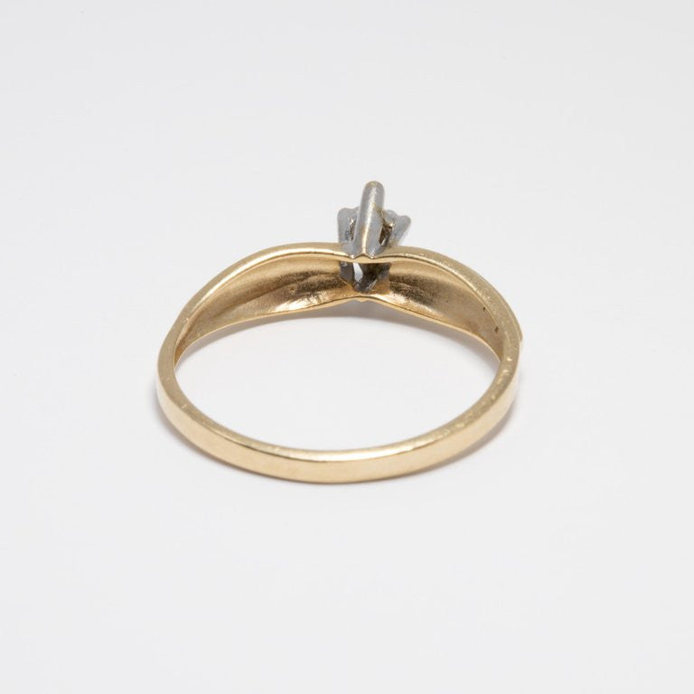 Diamond Solitaire Ring, 14 Yellow and White Gold Raised Setting, .05 ct Marquise
