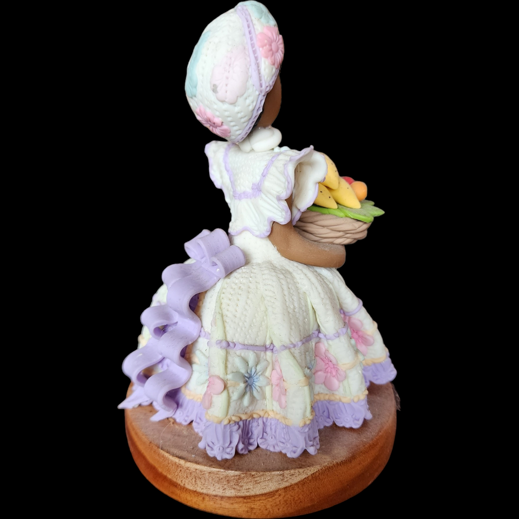 Nora Dominican Republic Faceless Doll Holding Basket of Fruit Wood Base Polymer Clay Figurine