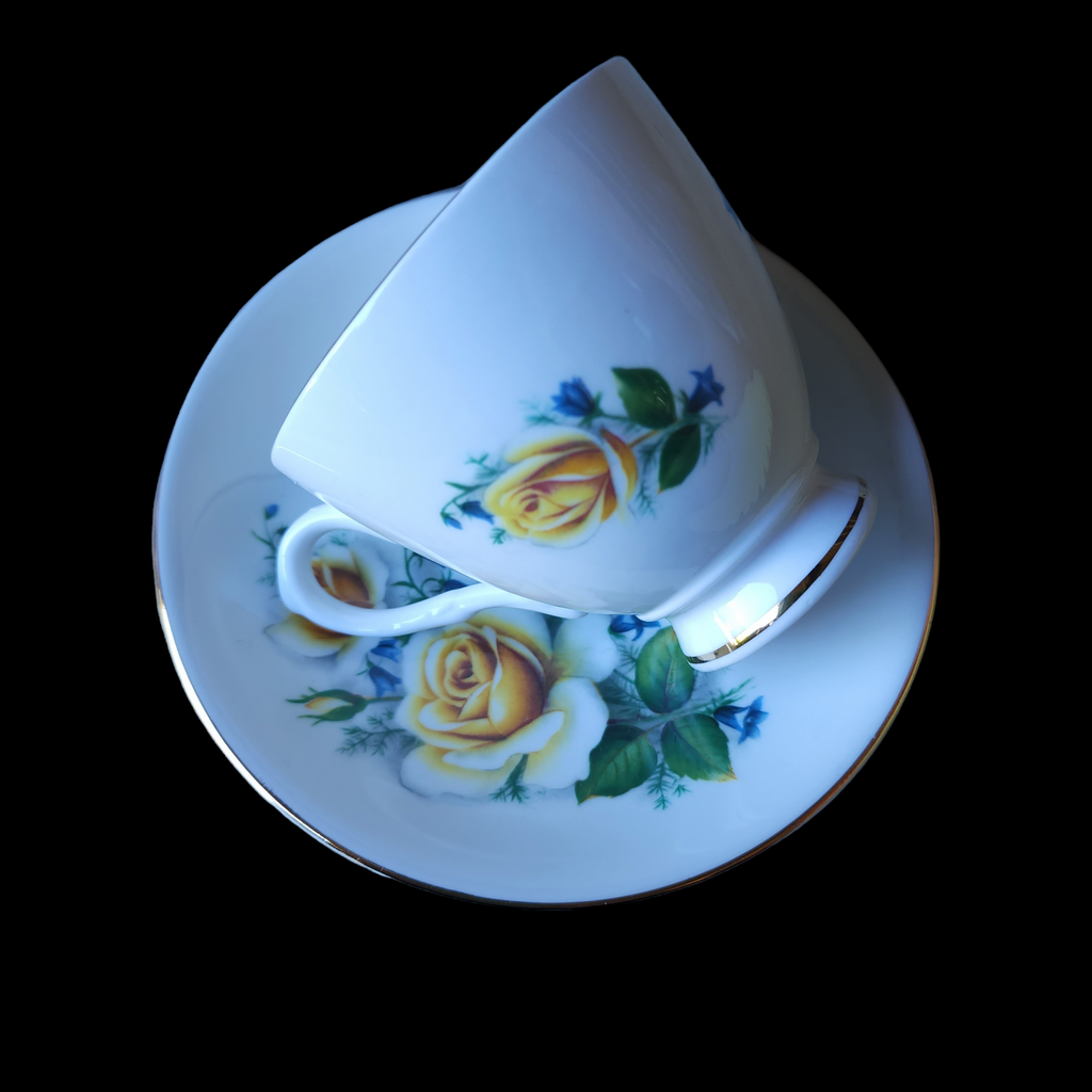 Roya Imperial Yellow Roses Off Center Gold Footed Teacup & Saucer Set