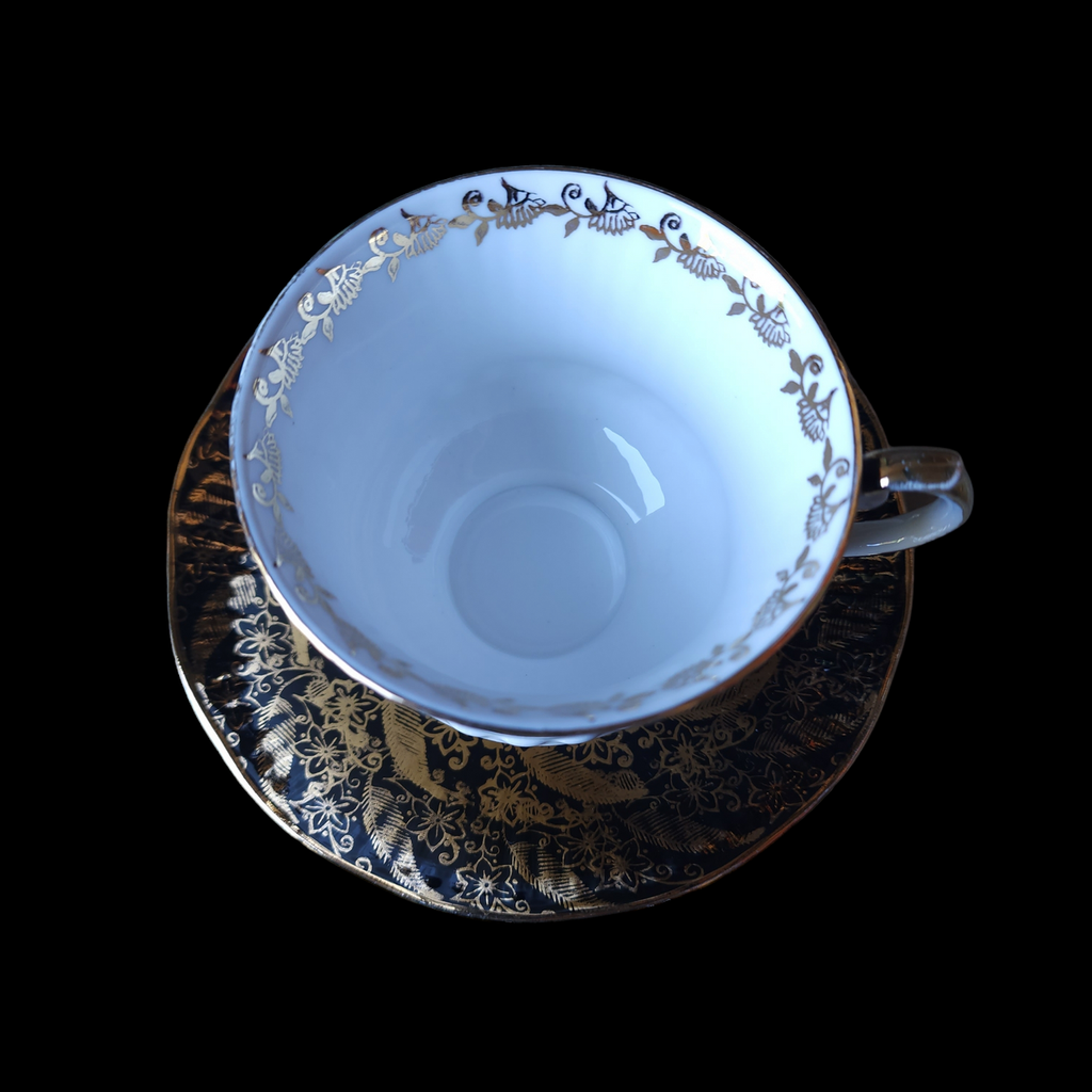 Elizabethan Sovereign Gold Floral & Leaves On Black Footed Cup & Saucer Set