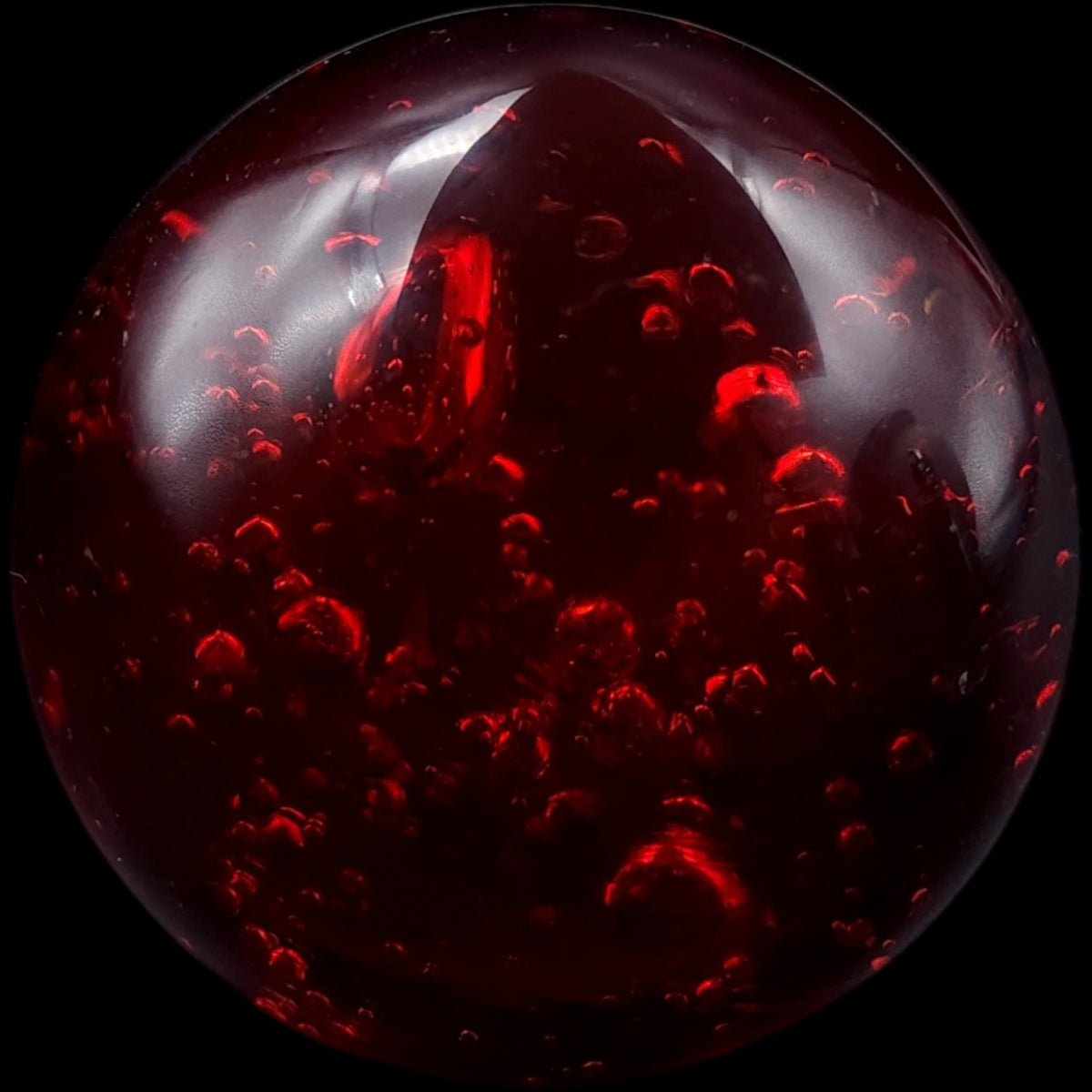 Vintage Red Art Glass Paperweight with Internal Bubbles and Shimmer