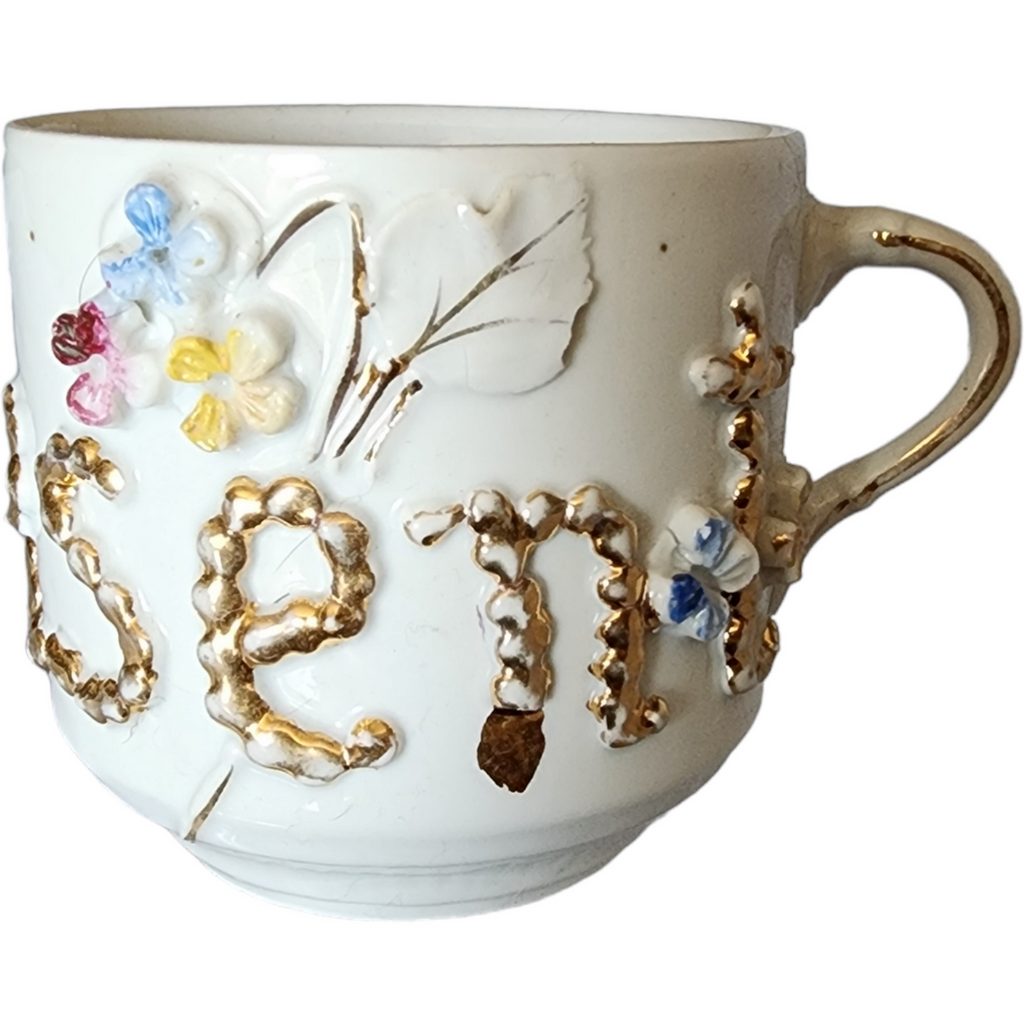 West Germany Porcelain Mustache Cup with Raised Floral and Gilt Decoration