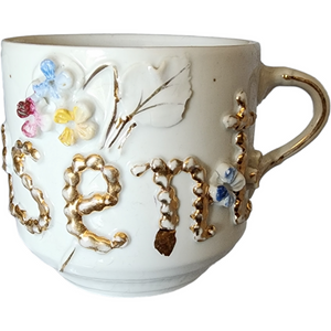 West Germany Porcelain Mustache Cup with Raised Floral and Gilt Decoration